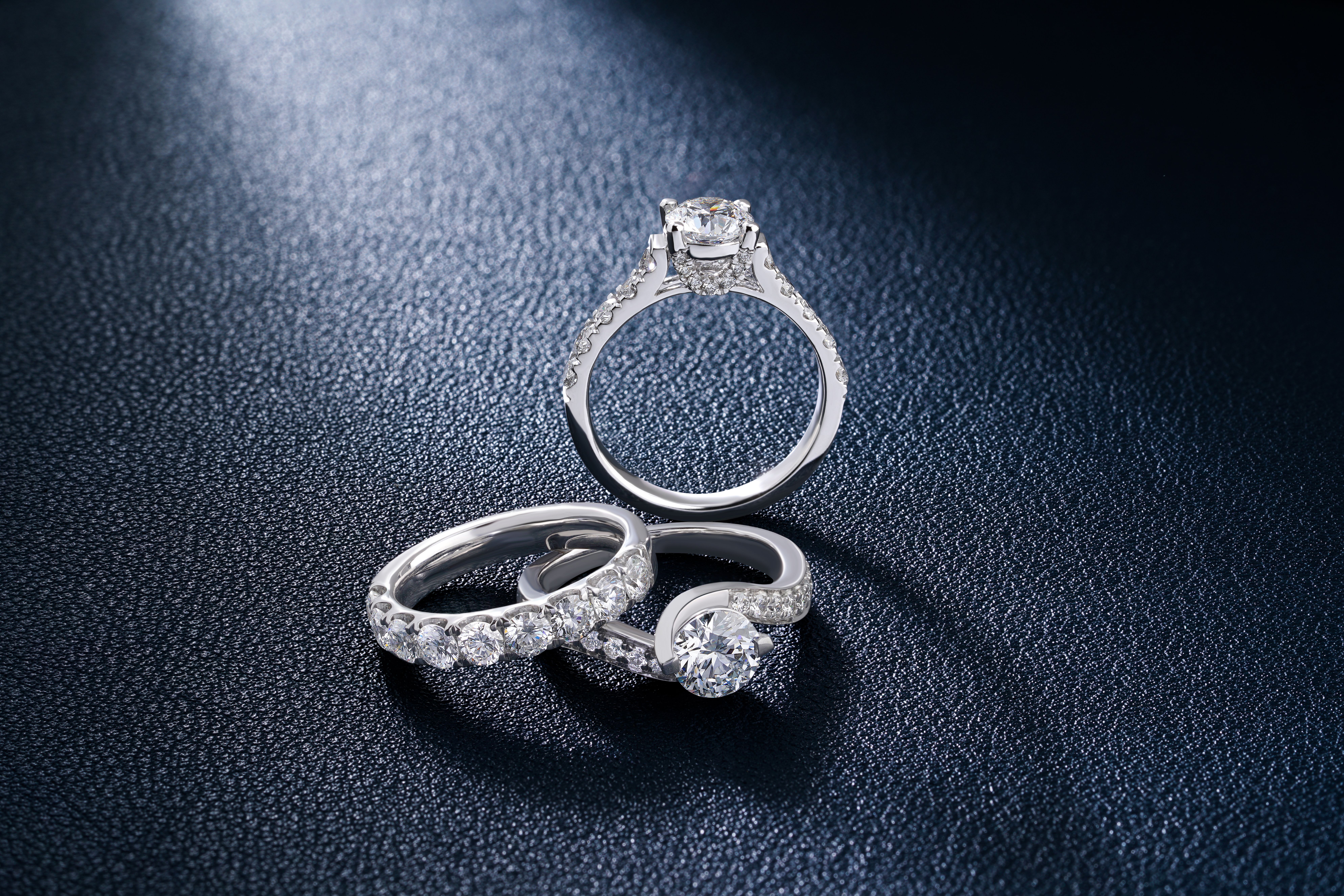 Close-up of diamond engagement and wedding rings, representing lab-grown diamond ring styles available in Hong Kong.